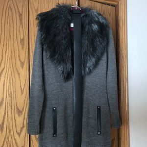 Michael Kors sweater, with detachable fur and belt .